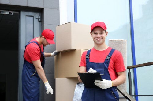 Local flat removals in Harringay with careful loading outside a residential apartment building