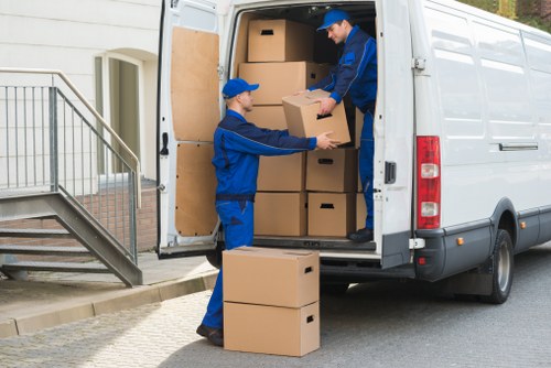 Office furniture and boxes prepared for a local commercial move