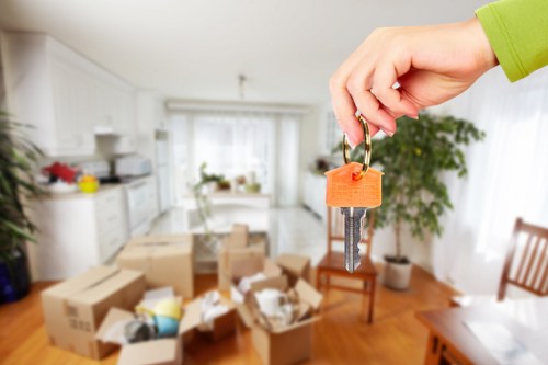 Trained movers carrying furniture carefully through a property in Harringay