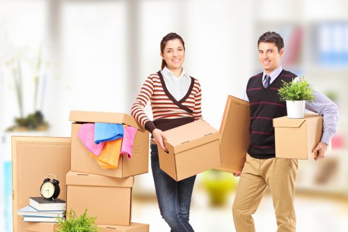 Packed boxes and household items prepared for a flat removal service in Harringay