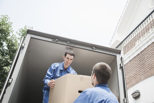 Loading a business move vehicle on a North London street